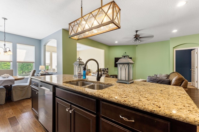 3736 Sanctuary, Hilliard, OH 43026 - kitchen with open floor plan, dishwasher, arched walkways, dark wood-style flooring, and recessed lighting