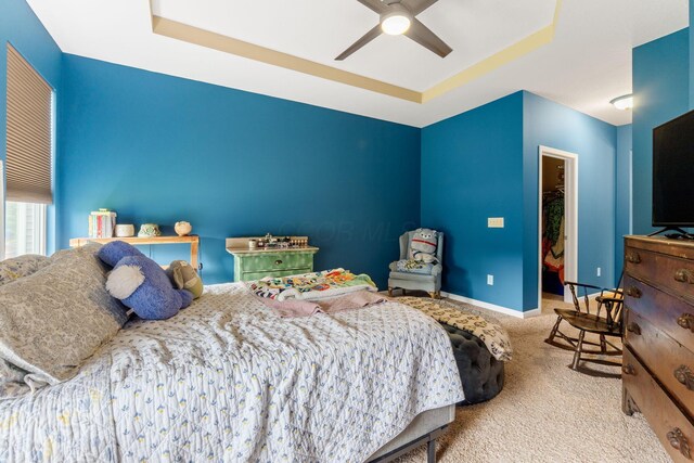 3736 Sanctuary, Hilliard, OH 43026 - bedroom featuring carpet, a ceiling fan, a walk in closet, and a raised ceiling