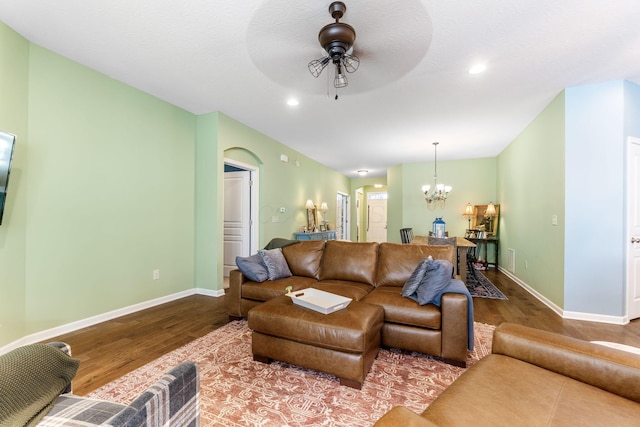 3736 Sanctuary, Hilliard, OH 43026 - living room featuring wood finished floors, a chandelier, ceiling fan, recessed lighting, and arched walkways