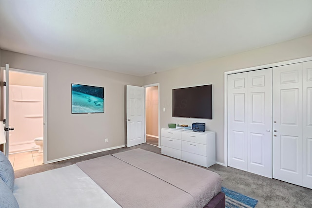 5359 Ivywood Ln, Columbus, OH 43229 - carpeted bedroom with a closet and ensuite bathroom