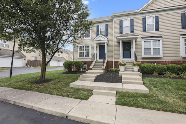 6310 Wagtail Rd Unit 6, Columbus, OH 43230 - multi unit property with a front lawn and entry steps