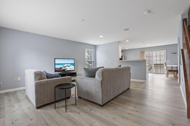 6310 Wagtail Rd Unit 6, Columbus, OH 43230 - living room featuring light wood-type flooring, baseboards, and recessed lighting