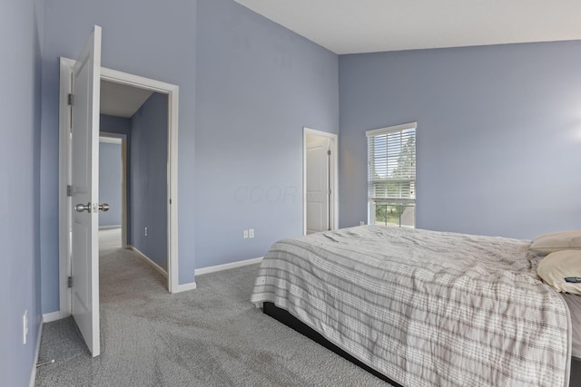 6310 Wagtail Rd Unit 6, Columbus, OH 43230 - bedroom with carpet floors, baseboards, and vaulted ceiling