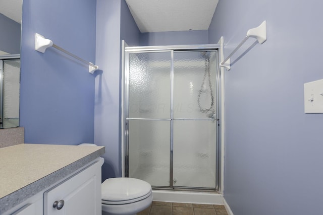 6310 Wagtail Rd Unit 6, Columbus, OH 43230 - full bathroom featuring a stall shower, vanity, toilet, and tile patterned floors