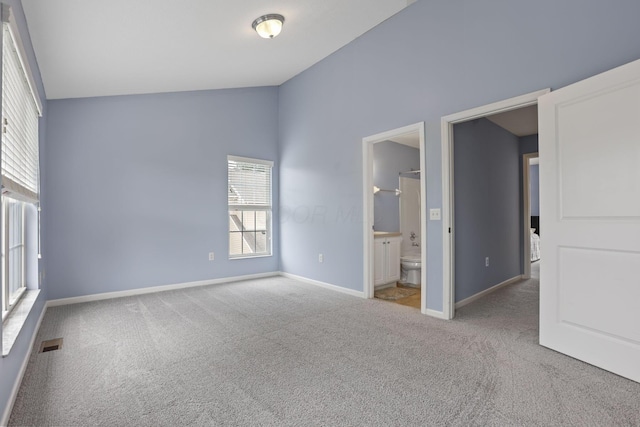 6310 Wagtail Rd Unit 6, Columbus, OH 43230 - unfurnished bedroom featuring carpet, baseboards, vaulted ceiling, and ensuite bath