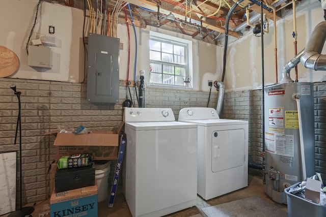 6310 Wagtail Rd Unit 6, Columbus, OH 43230 - laundry room featuring washer and dryer, water heater, and electric panel