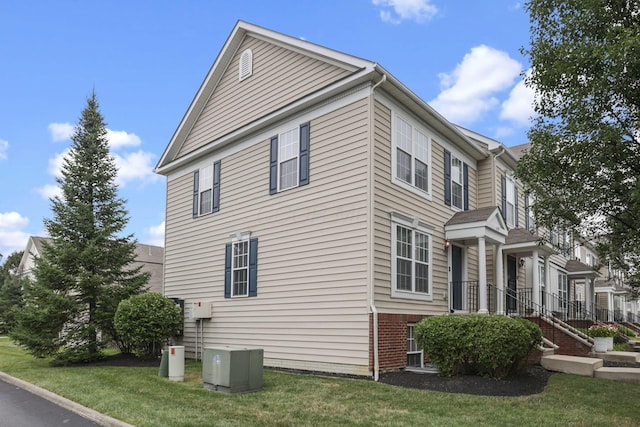 6310 Wagtail Rd Unit 6, Columbus, OH 43230 - view of home's exterior featuring a yard