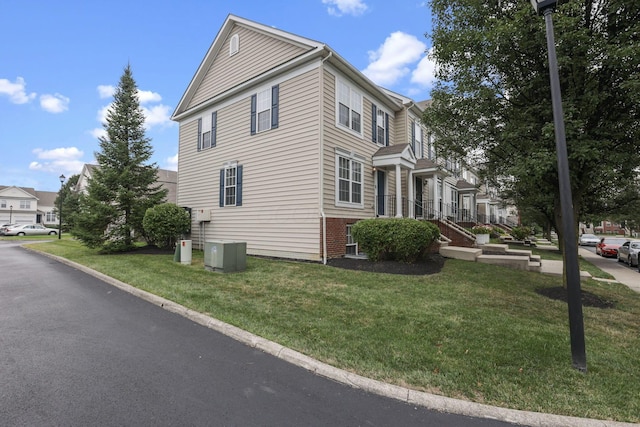 6310 Wagtail Rd Unit 6, Columbus, OH 43230 - view of side of property featuring central AC and a yard