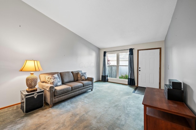 797 Timber Way Dr Unit 16C, Columbus, OH 43085 - living area featuring carpet floors, vaulted ceiling, and baseboards