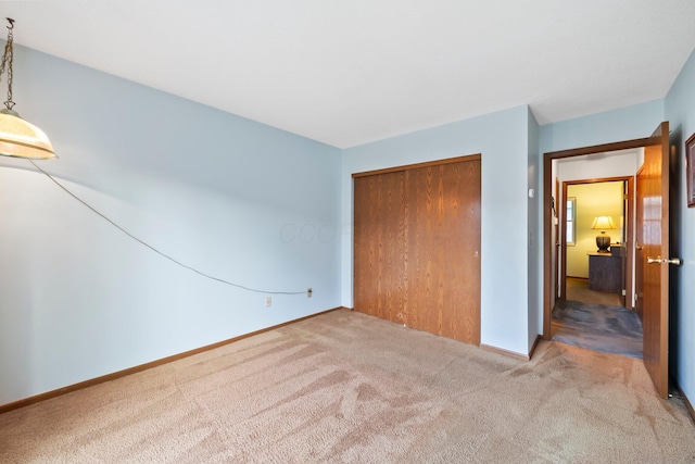 797 Timber Way Dr Unit 16C, Columbus, OH 43085 - unfurnished bedroom with carpet floors, a closet, and baseboards