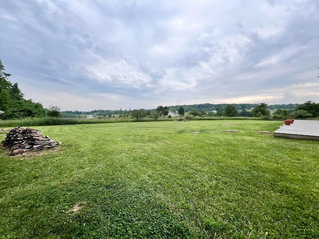 20600 Hellwig Rd, Utica, OH 43080 - view of green lawn with a deck and a view of countryside