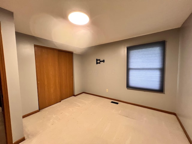 20600 Hellwig Rd, Utica, OH 43080 - unfurnished bedroom featuring carpet, baseboards, and a closet