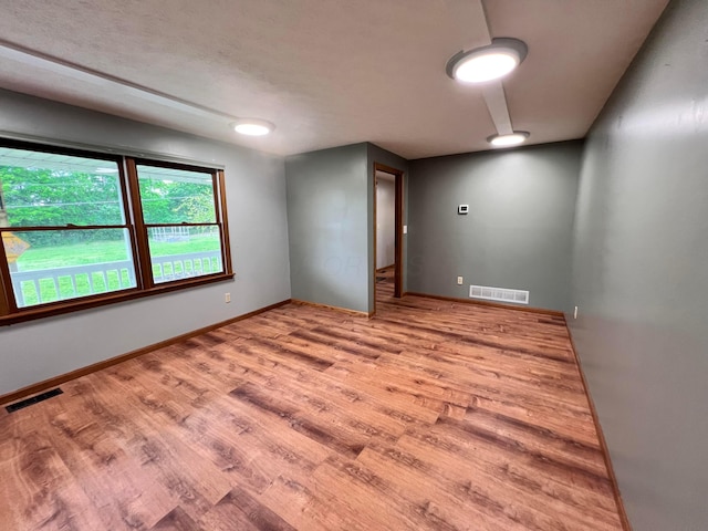 20600 Hellwig Rd, Utica, OH 43080 - unfurnished room with wood finished floors and baseboards