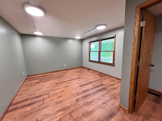 20600 Hellwig Rd, Utica, OH 43080 - empty room featuring wood finished floors and baseboards