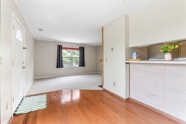3013 La Vista Dr Unit 29, Columbus, OH 43204 - unfurnished living room featuring light wood-style flooring and baseboards