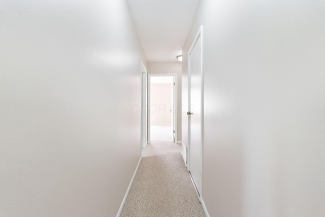 3013 La Vista Dr Unit 29, Columbus, OH 43204 - hall featuring baseboards and light carpet