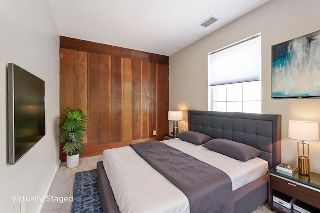3013 La Vista Dr Unit 29, Columbus, OH 43204 - bedroom featuring carpet flooring and wooden walls