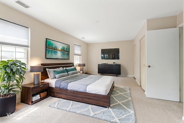 3013 La Vista Dr Unit 29, Columbus, OH 43204 - bedroom with light carpet and baseboards