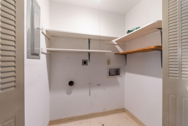 3013 La Vista Dr Unit 29, Columbus, OH 43204 - laundry room featuring washer hookup, electric dryer hookup, tile patterned floors, baseboards, and gas dryer hookup