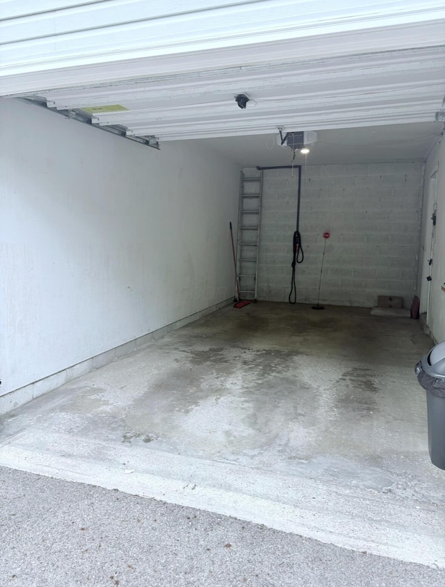 3013 La Vista Dr Unit 29, Columbus, OH 43204 - garage featuring a garage door opener