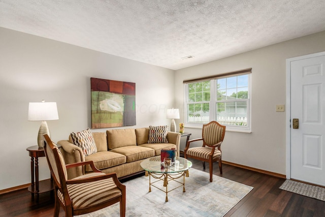 4393 Hammerton Dr Unit 14B, Columbus, OH 43228 - living room with wood finished floors and a textured ceiling