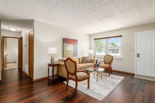4393 Hammerton Dr Unit 14B, Columbus, OH 43228 - living area featuring dark wood-style floors and a textured ceiling