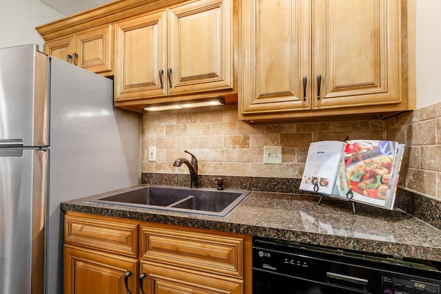 4393 Hammerton Dr Unit 14B, Columbus, OH 43228 - kitchen with dishwasher, tasteful backsplash, dark countertops, and freestanding refrigerator