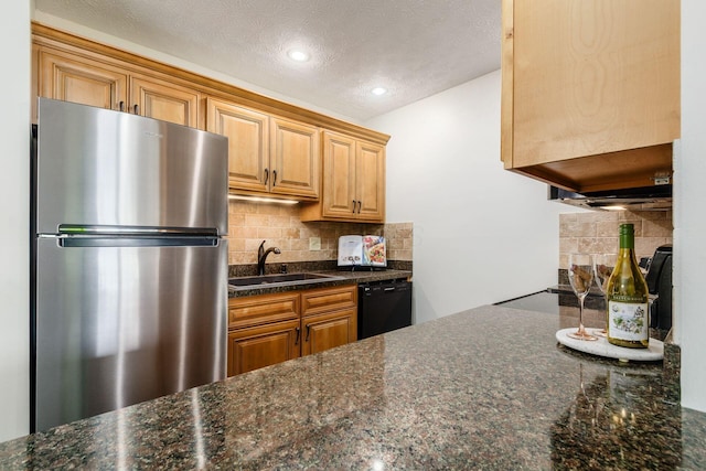 4393 Hammerton Dr Unit 14B, Columbus, OH 43228 - kitchen with freestanding refrigerator, black dishwasher, backsplash, a textured ceiling, and recessed lighting