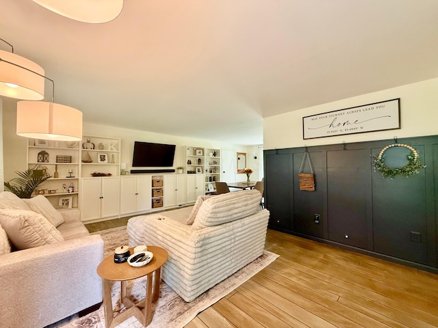 1855 Itawamba Trl, London, OH 43140 - living area with hardwood / wood-style flooring and built in features