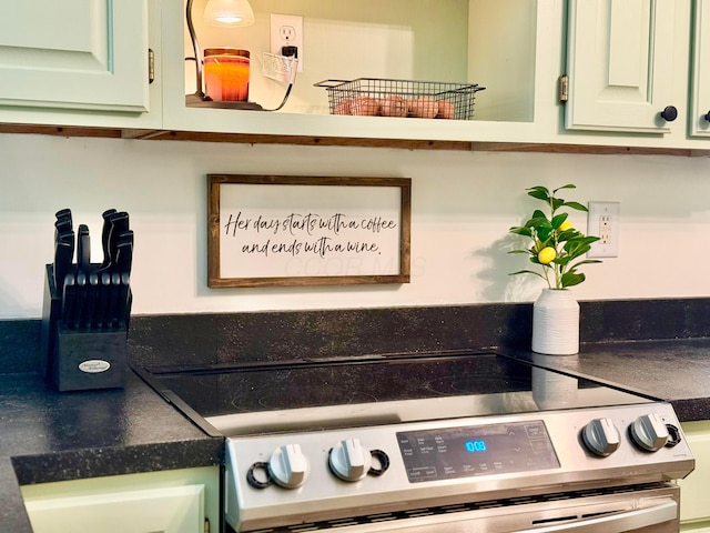 1855 Itawamba Trl, London, OH 43140 - kitchen view of electric stove and green cabinets