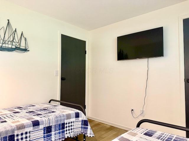 1855 Itawamba Trl, London, OH 43140 - bedroom with wood finished floors and baseboards