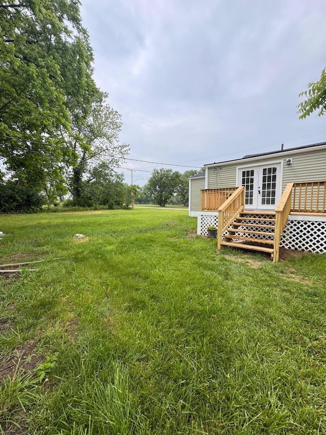 1729 E 17th Ave, Columbus, OH 43219 - view of green lawn with a wooden deck
