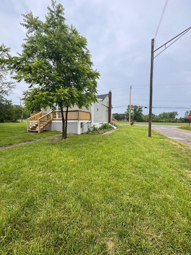 1729 E 17th Ave, Columbus, OH 43219 - view of grassy yard with a deck