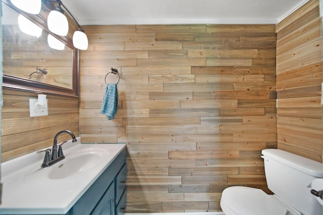 3795 Morral Kirkpatrick Rd E, Marion, OH 43302 - half bathroom featuring wooden walls, toilet, and vanity
