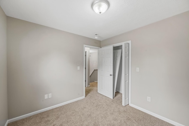 845 Bennett St, Marion, OH 43302 - unfurnished bedroom with light carpet and baseboards