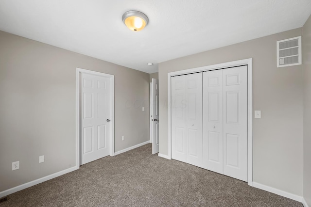 845 Bennett St, Marion, OH 43302 - unfurnished bedroom featuring carpet, baseboards, and a closet