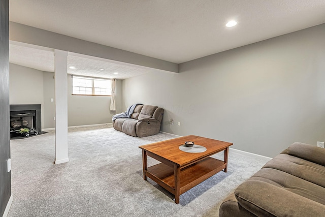 8281 Deering Oaks Dr, Blacklick, OH 43004 - carpeted living area with recessed lighting, baseboards, and a fireplace with flush hearth