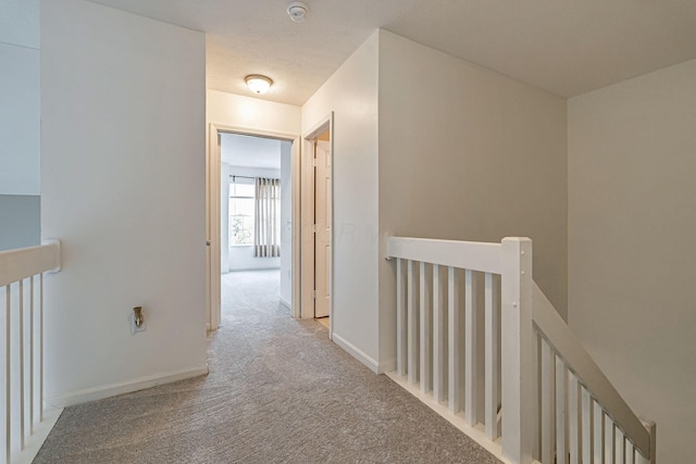 8281 Deering Oaks Dr, Blacklick, OH 43004 - hall with an upstairs landing, carpet, and baseboards