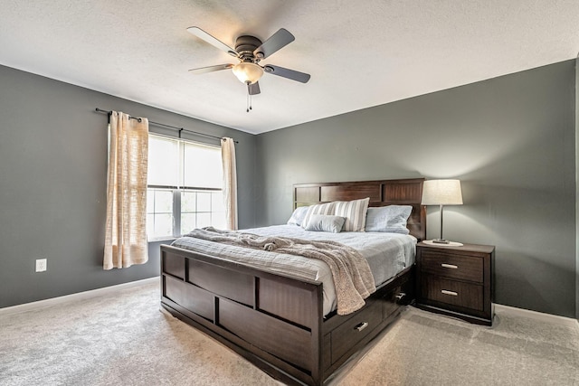 8281 Deering Oaks Dr, Blacklick, OH 43004 - bedroom with light carpet, baseboards, ceiling fan, and a textured ceiling