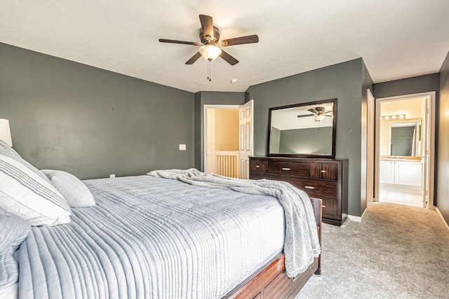 8281 Deering Oaks Dr, Blacklick, OH 43004 - bedroom with light colored carpet, ceiling fan, ensuite bathroom, and baseboards