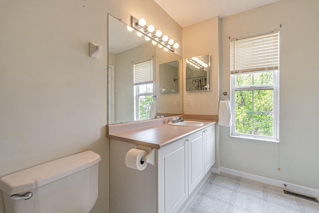 8281 Deering Oaks Dr, Blacklick, OH 43004 - bathroom with toilet, baseboards, and vanity