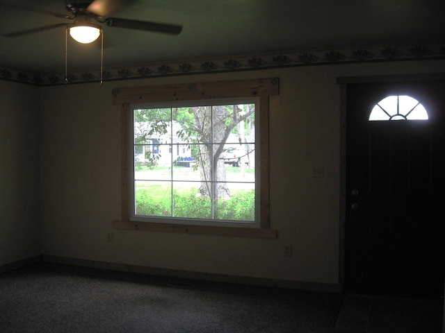 252 Randolph St, Wilmington, OH 45177 - entrance foyer featuring ceiling fan and baseboards