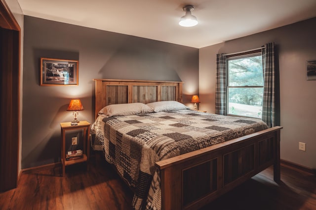 16360 Kreashbaum Rd, Rockbridge, OH 43149 - bedroom featuring dark wood-style floors and baseboards