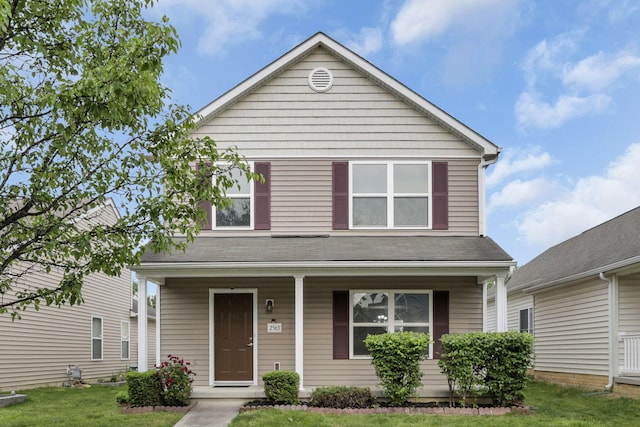2563 Bristlecone Ln, Grove City, OH 43123 - view of front of home featuring covered porch and a front lawn