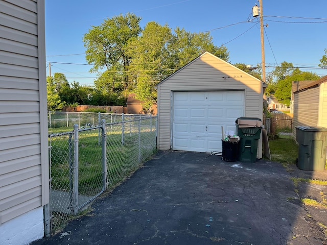 2296 Joyce Ave, Columbus, OH 43211 - detached garage featuring asphalt driveway