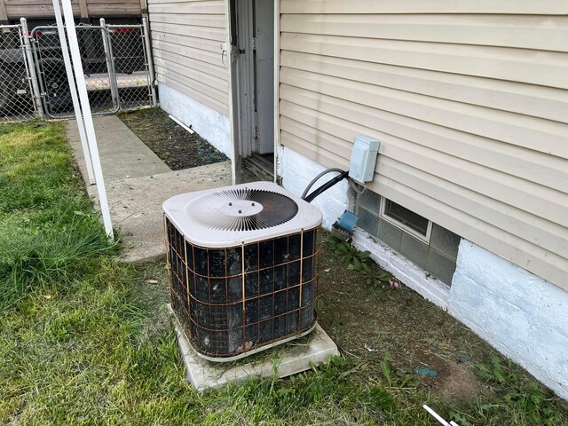 2296 Joyce Ave, Columbus, OH 43211 - exterior view of central AC and crawl space