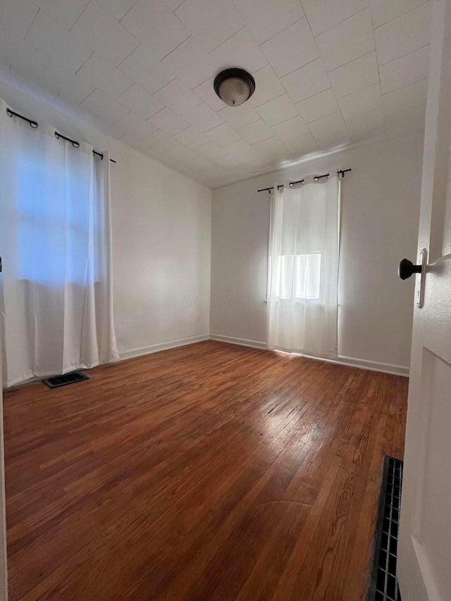 2296 Joyce Ave, Columbus, OH 43211 - unfurnished room featuring hardwood / wood-style flooring