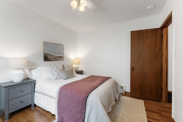 525 E Como Ave, Columbus, OH 43202 - bedroom with wood finished floors and a ceiling fan