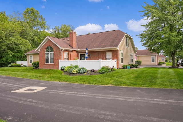 4654 Collingville Way, Columbus, OH 43230 - view of front of house featuring a chimney and brick siding