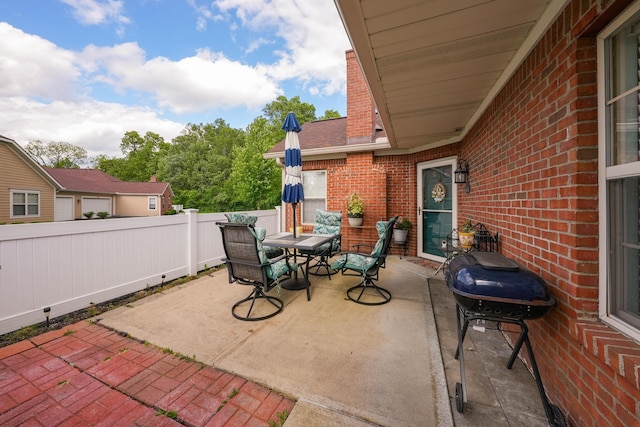 4654 Collingville Way, Columbus, OH 43230 - view of patio / terrace with outdoor dining area and a grill